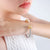 Minimalist Shiny Round Titanium Steel 18K Gold Plated Zircon Bangle In Bulk